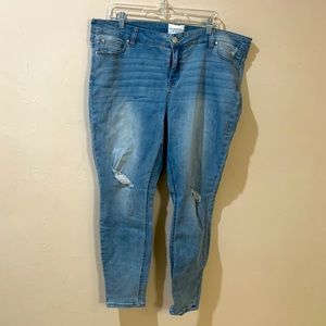 Medium wash, distressed skinny jeans.